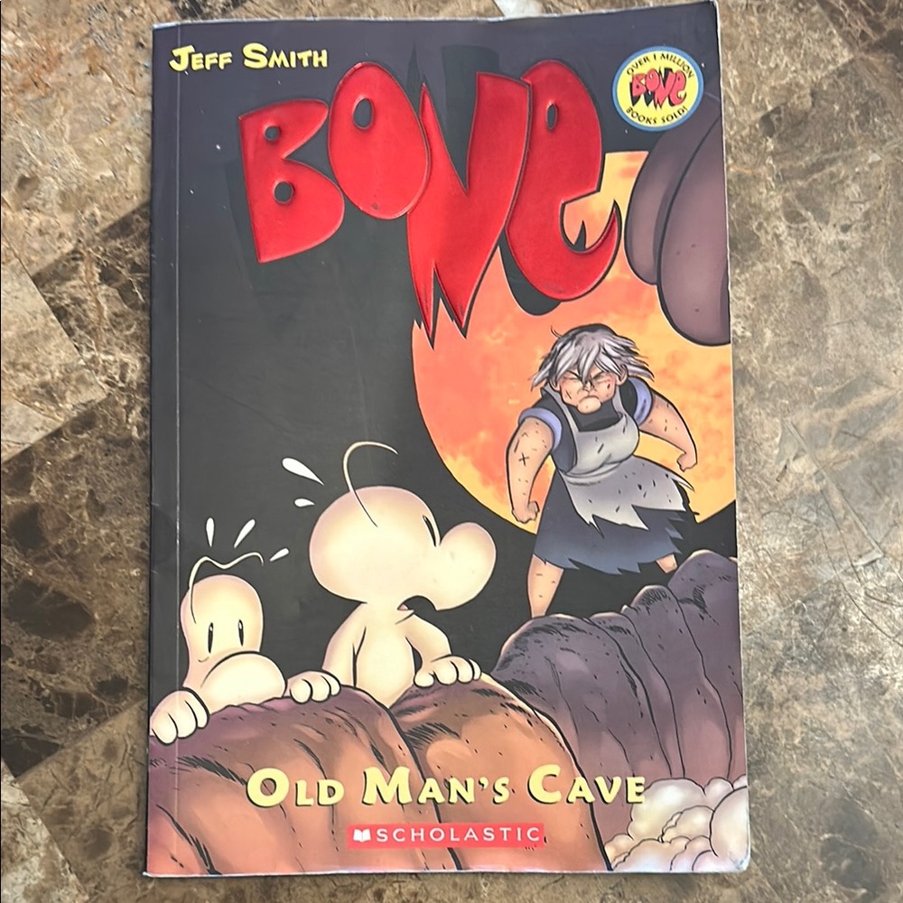 Scholastic Bone Old Man’s Cave Soft Cover Book